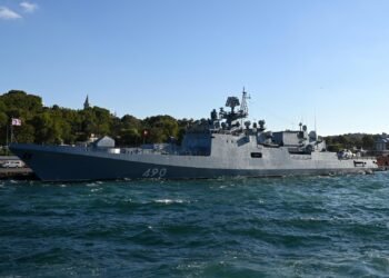 A Russian warship fires defensive missiles at Britain