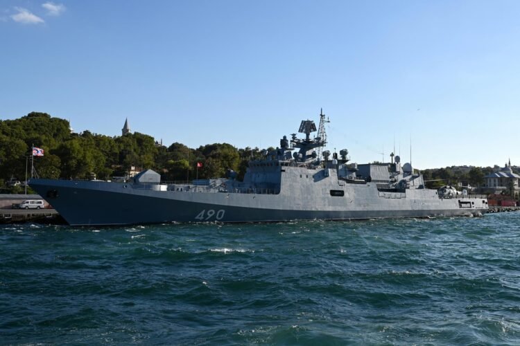 A Russian warship fires defensive missiles at Britain