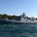 A Russian warship fires defensive missiles at Britain