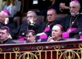 A member of the clergy appears to nod off during the Pope’s speech in the Congress of Deputies