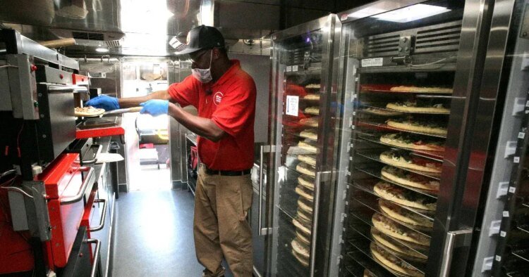 Telex: An entrepreneur baked the pizza in a delivery truck so that it could be delivered straight from the oven to the table.