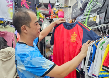 World Cup brings cautious merchandise sales while cafés invest in big screens in Ho Chi Minh City