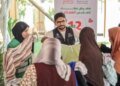 Al-Jarhi, a member of the National Alliance, participates in organizing the Ataa Clothes Exhibition to distribute 12,000 pieces in Giza
