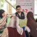 Al-Jarhi, a member of the National Alliance, participates in organizing the Ataa Clothes Exhibition to distribute 12,000 pieces in Giza