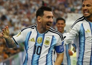 Magical Messi makes World Cup history to send Argentina into last 32