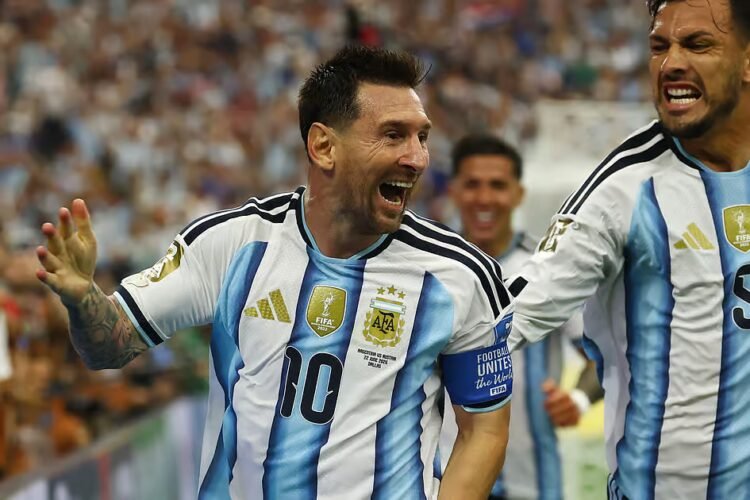 Magical Messi makes World Cup history to send Argentina into last 32