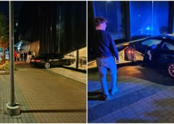 A BMW drove into the hotel restaurant in Vilnius after breaking the glass window wall