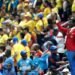In the stands of the World Cup, this man pays tribute as a living statue (for ninety minutes) to the first Prime Minister of Congo, the murdered Patrice Lumumba