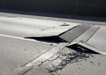 Heat damages road on A13
