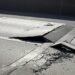 Heat damages road on A13