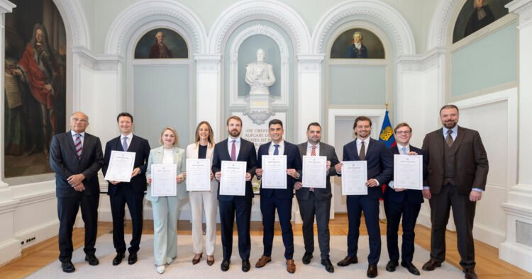 Lawyer diplomas ceremoniously presented
