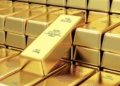 Gold is headed for a third weekly loss amid the rise in the dollar