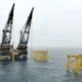 Oil prices fell by about 1 percent