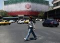 Iran says draft US deal includes oil sanctions waiver, asset release