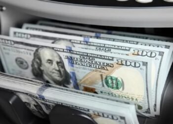 The dollar is heading for its largest monthly gain in a year