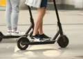 A child without a helmet and brakes on an electric scooter collided with a car
