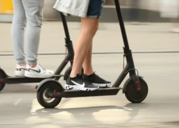 A child without a helmet and brakes on an electric scooter collided with a car