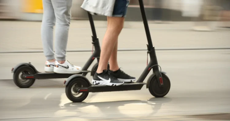 A child without a helmet and brakes on an electric scooter collided with a car
