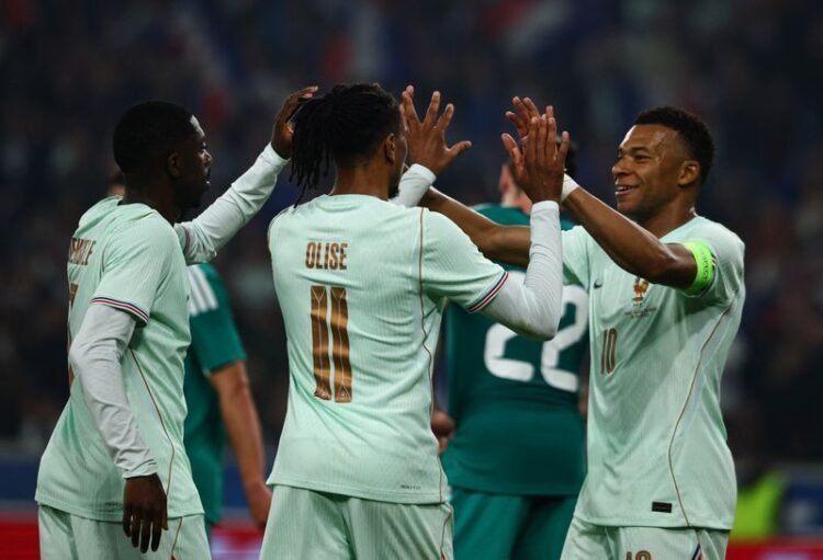 Football: Soccer-Dembele says criticism of France captain Mbappe has gone too far