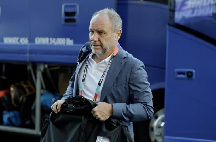 Football: Soccer-Haiti exit World Cup but coach Migne says team proved they belong