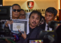 Ex-Indonesian minister Roy Suryo detained for defamation in Jokowi’s diploma case