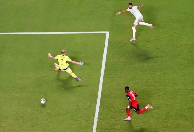 Football: Soccer-Austria draw with Algeria in World Cup thriller to progress and send Iran home