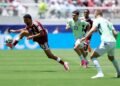 Qatar earn first ever WCup point with late goal