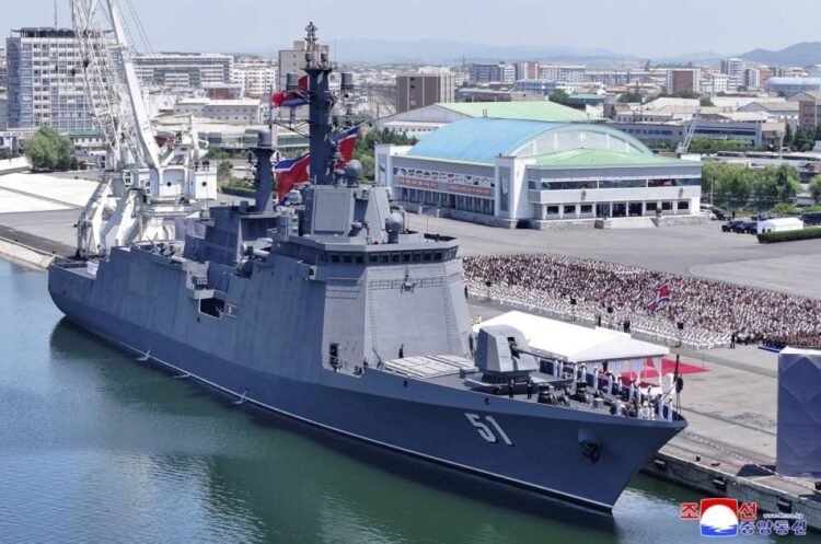 North Korea’s Kim unveils plans for 10,000-ton warships, nuclear navy