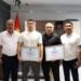 In Osh, Akzhol Makhmudov and his coach Meirambek Akhmetov were awarded cash certificates