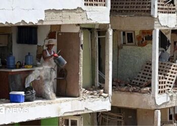 Rescuers ‘pulling people out with their bare hands’ as earthquakes kill 920