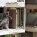 Rescuers ‘pulling people out with their bare hands’ as earthquakes kill 920