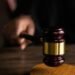 Six Dominicans are accused of stealing more than 1.4 million dollars from a social program in the US.