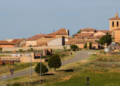 They are looking for volunteers to live for free in a town in Spain surrounded by mountains and offer guaranteed work
