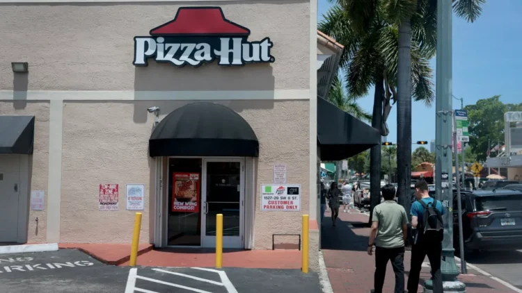 Yum sells Pizza Hut for $2.7 billion in two deals