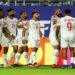A Slovenian refereeing team officiates the match between Jordan and Algeria in the World Cup