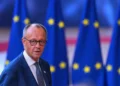Germany’s leader pledges to reform a creaking pension system and says ‘failure is not an option’