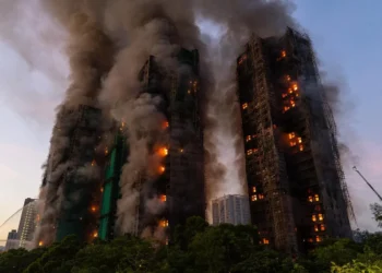 Hong Kong charges 7 people and 2 firms over massive fire that killed 168