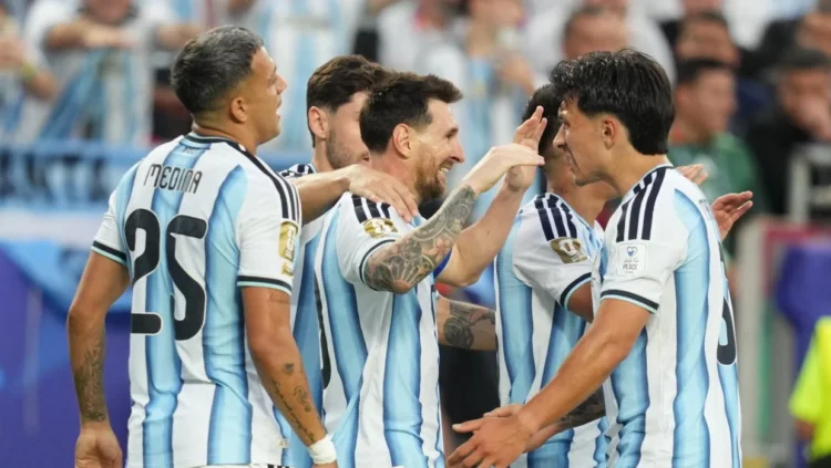 Messi scores his first World Cup hat-trick as Argentina brushes off Algeria