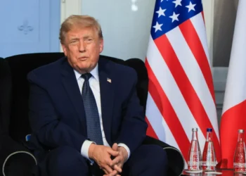 Why did the Revolutionary Guard agree to a settlement with Donald Trump?