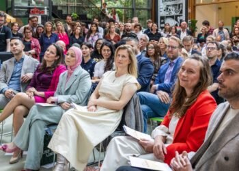 Does “Our Amsterdam” policy include internationals and startups?
