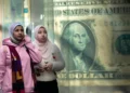 Dollar rises on AI boom and Fed shift, despite Trump impact