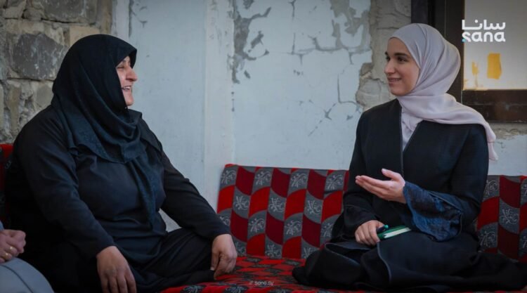 First Lady Latifa al-Droubi meets Idlib school principal recognized for community work