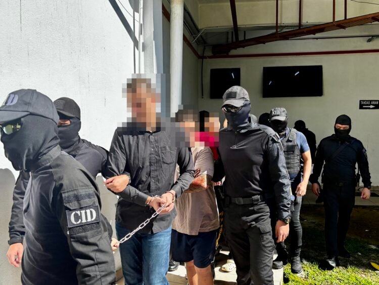 Twenty-three men plead not guilty to organised crime charges in Kuching