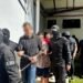 Twenty-three men plead not guilty to organised crime charges in Kuching