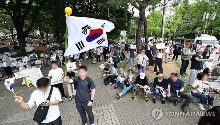 Thousands rally for 3rd day demanding new election over ballot shortages