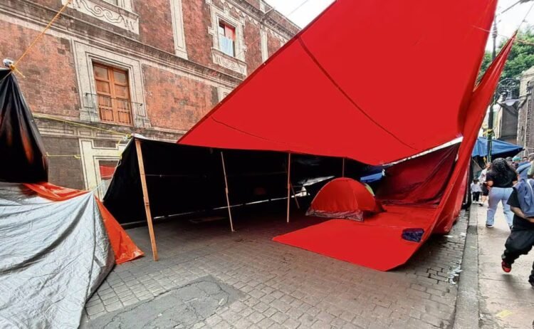 …They install tarps and pretend to protest in the Center