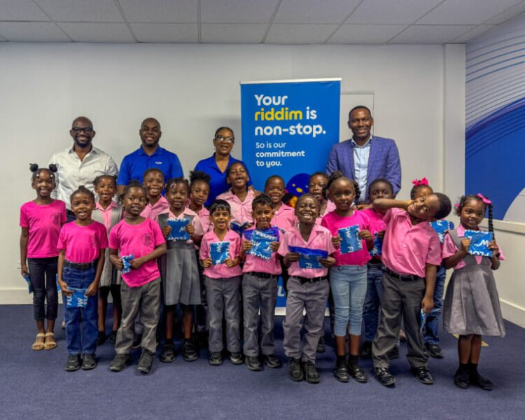 Flow Antigua Donates Laptop to Seaview Farm Primary Following Educational Tour