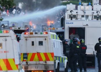 Belfast, Northern Ireland: Police fire water cannon on second night of as anti-immigrant protests