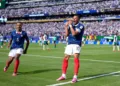 Mbappe shines in France’s first win