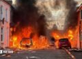 Homes set on fire in Belfast night of violence as MP says people targeted based on skin colour – follow live